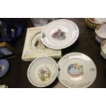 A Royal Doulton Bunnykins clock, plus a Beatrix Potter Wedgwood bowl and two plates