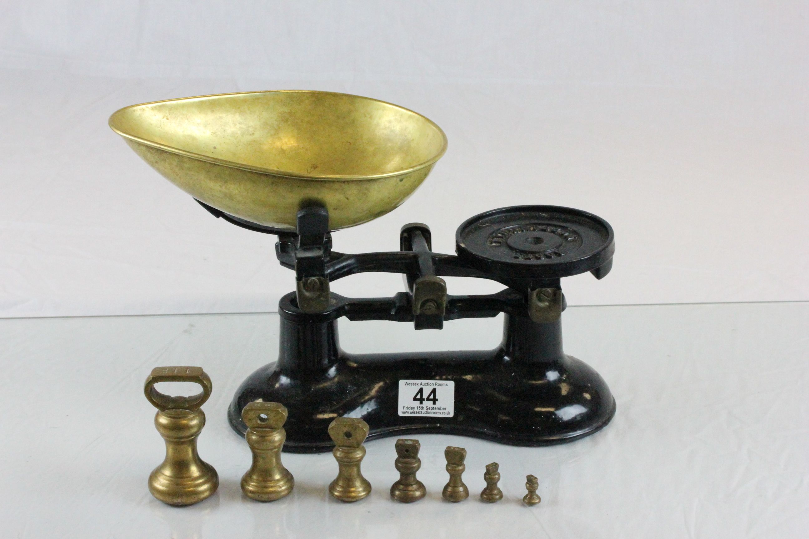 Vintage Set of ' Boots ' Scales with Brass Pans and Seven Brass Weights