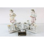 A continental glass topped display casket, pair of continental figures and similar posy holders.