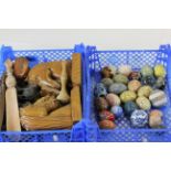 Tray of stone, ceramic & wooden eggs plus a tray of wooden ware including book ends