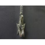 A silver Masonic pendant necklace