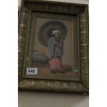 A gilt framed oil painting portrait of a geisha girl