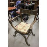 Early 20th century Oak Heavily Carved X-Frame Chair