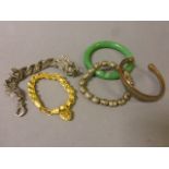 Five Asian bracelets to include Dragon and hardstone