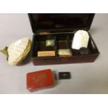 Lacquered box with contents plus a shell with seaweed examples