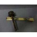 Tibetan prayer wheel and a carved bone