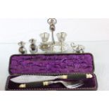 Cased set of silver plated fish servers, silver plated cruet set and egg cup set plus a hallmarked