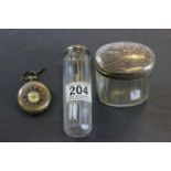 Two hallmarked silver topped cut glass vanity items and a white metal half hunter pocket watch