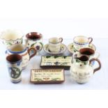 Ten items of Torquay Motto ware pottery