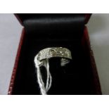 A silver and cz Cartier style love ring