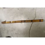 A vintage bamboo Hardy Brothers rod holder together with rods pieces - middle and top sections.