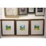 Set of three Indonesian oil paintings of figures working in cultivated fields, in contemporary
