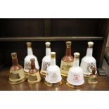 Nine Wade Bell's Whiskey Decanters, various sizes, all sealed and full