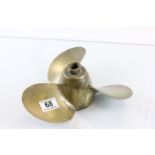 A vintage brass boat propeller