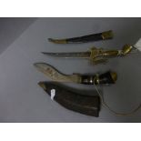 A Kukri knife and a letter opener in Egyptian style