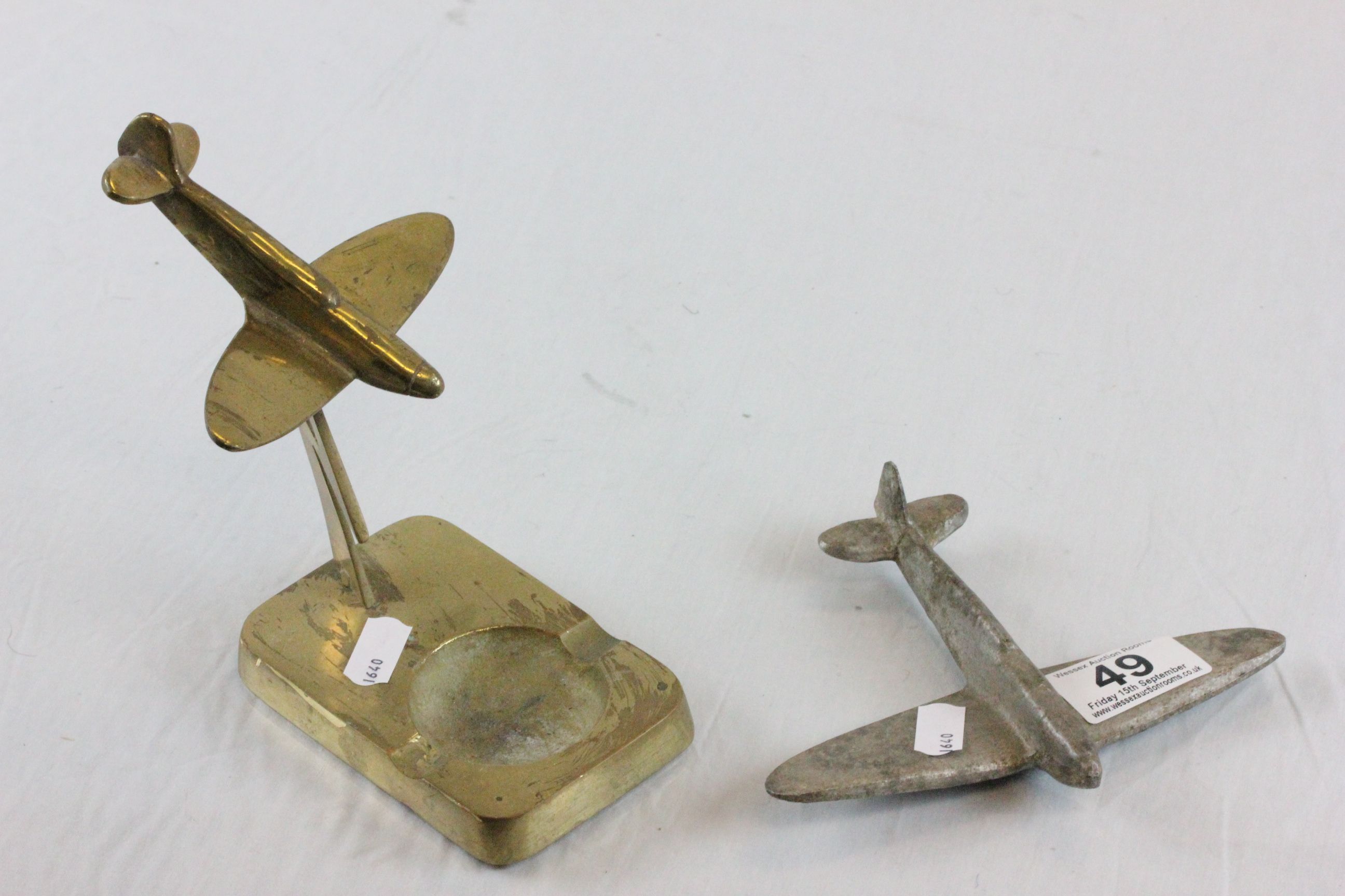 Brass trench art type ashtray with Spitfire and lightning bolt decoration plus a similar aircraft