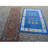 Gobu Runner Rug (243cm x 69cm approx.) together with Cameo Handcrafted Blue and White Rug (183cm x