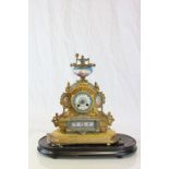 19th century French Gilt Mantle Clock with Blue Painted Ceramic Face, Panels and Finial decorated