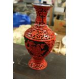 A cinnabar style vase