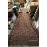 Middle Eastern Red Ground Rug and another