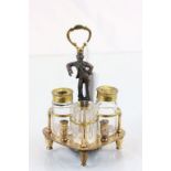 Early 19th century Gilt metal & glass three piece Cruet set with a Figure of a Man to handle