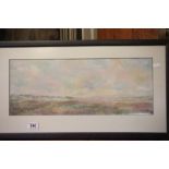 A framed watercolour moorland scene.