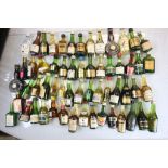 Large quantity of miniatures to include Cognacs,,rum,etc approx 100 .