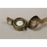 Brass compass TG Co Ltd London with crow foot mark