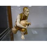 Royal Worcester figure of an Eastern water carrier