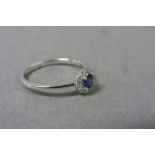 18ct White Gold Sapphire and Diamond cluster ring