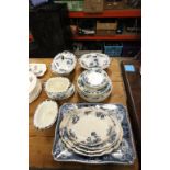 A part 19th century transfer printed blue and white dinner service. with floral pattern.