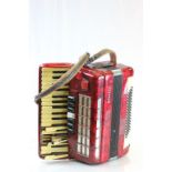 A cased Baile accordian for repair.