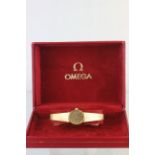 Ladies hallmarked 18ct Gold Omega De Ville wristwatch with original box & papers