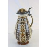 Large German pottery stein with hinged pewter lid, marked to base "Gegen Nachbildung"