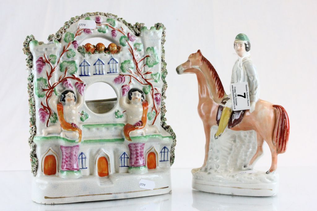 Staffordshire pottery flatback Jockey on Horse and a Pocket watch stand in the form of a building