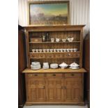 Pine Dresser, the shelves with six spice drawers over Three Drawers and Three Cupboards