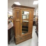Shapland & Petter, Arts and Crafts Oak Wardrobe with stylised carved panels, single glazed mirror