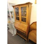 Arts and Crafts Oak Bureau / Bookcase, the upper section with leaded glazed doors with stylised