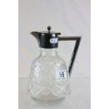 Christopher Dresser style cut glass and silver plated claret jug