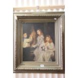 Oil painting of three children contained within an ornate gilt frame