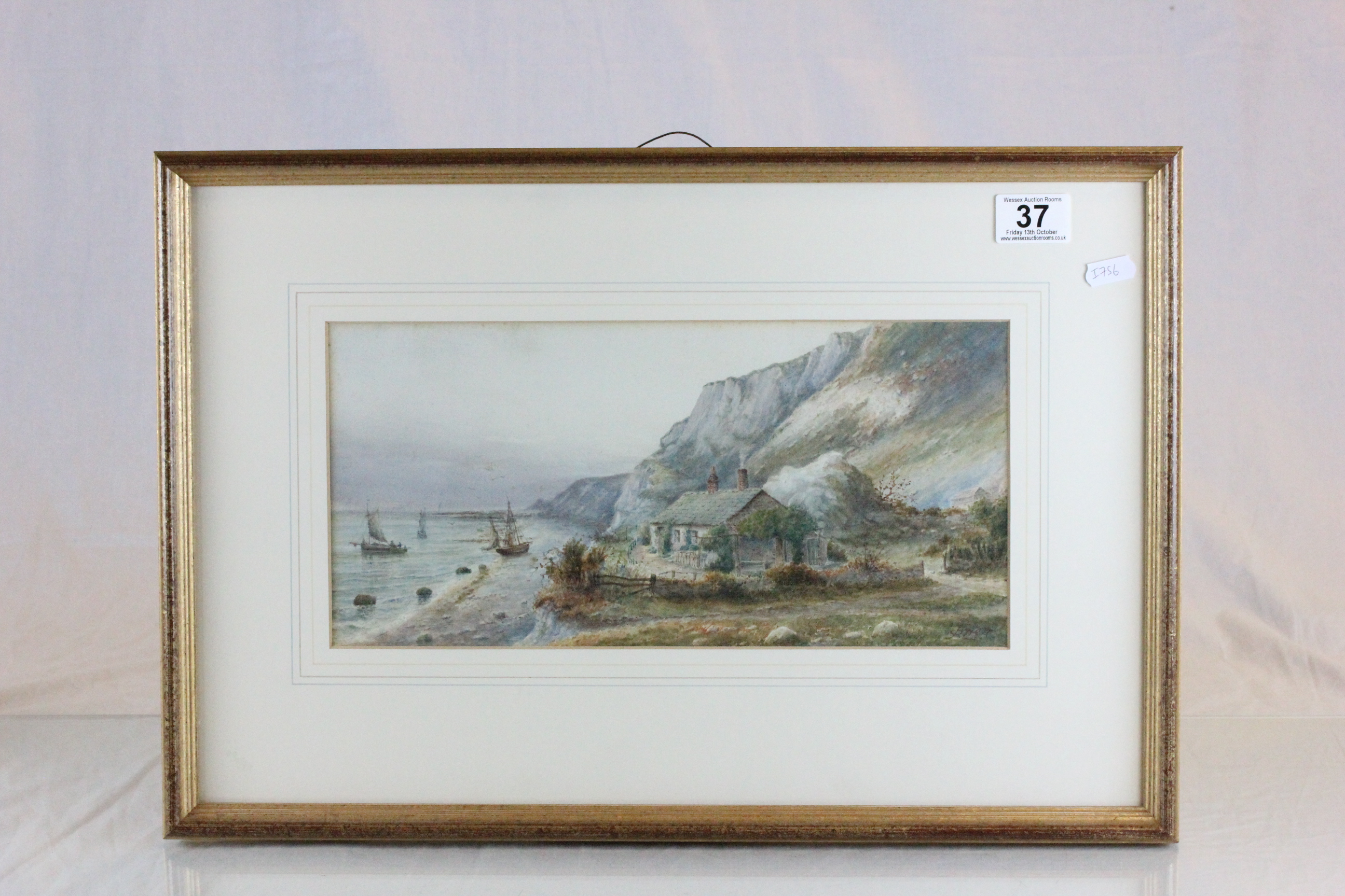 Framed & glazed watercolour of a Coastal scene with cottage, signed J Owen