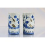 Pair of good late 19th/early 20th Century vases 11cm high, decorated in blue & gold colours,