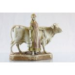 Royal Dux figurine of Milkmaid with Cow, numbered 988 with pink triangle mark to base