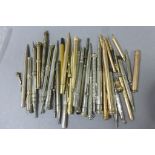 Collection of vintage propelling pencils and dip pens including two silver bridge pencils