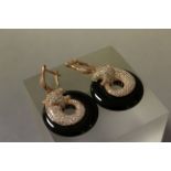 Pair of Silver gilt and onyx Cartier style panthers earrings