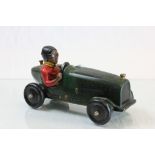 Ceramic model of a vintage racing car and driver