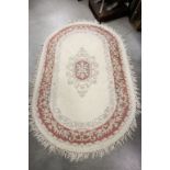 Cream Ground Oval Rug