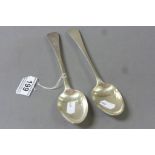 Two Georgian hallmarked Silver serving spoons with rubbed hallmarks