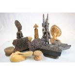 A group of treen items to include tribal masks etc.