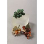 Three semi precious stone paperweights